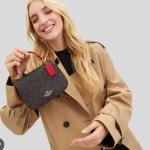 Lysa Top Handle Bag In Signature Canvas With Gold