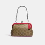 Nora Kisslock Crossbody